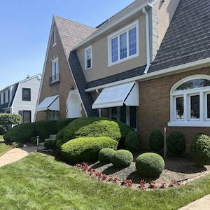 front view of a house highlighting a landscape design done